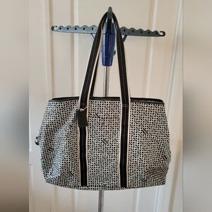 Coach Penelope Op Art Signature PVC Weekender Carry-On Tote in black and white.